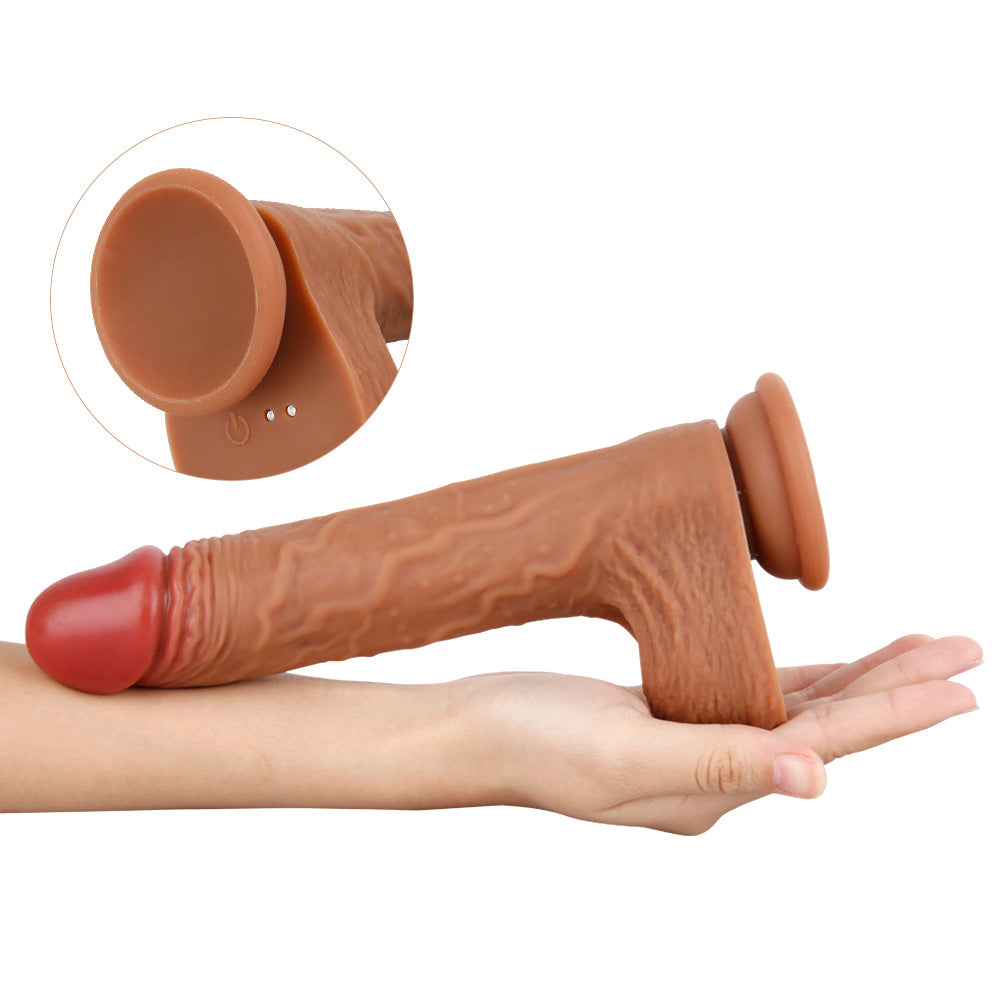 dildo resting on forearm to demonstrate size, texture, and lifelike form