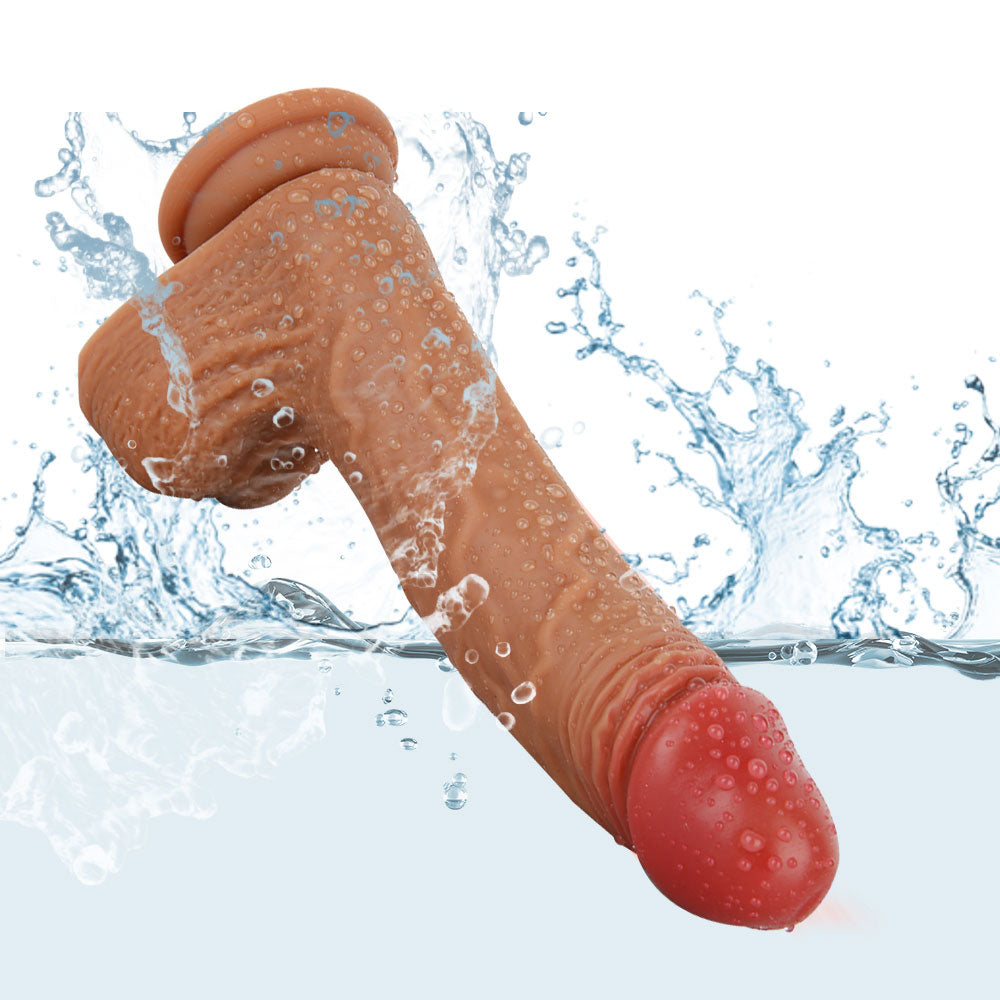 waterproof dildo shown wet to highlight safe cleaning and submersible design