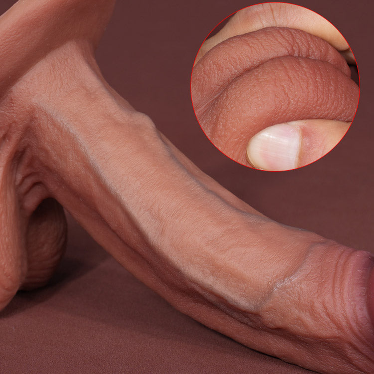 close-up of sculpted balls and thick shaft with delicate silicone texture and hand-painted veins