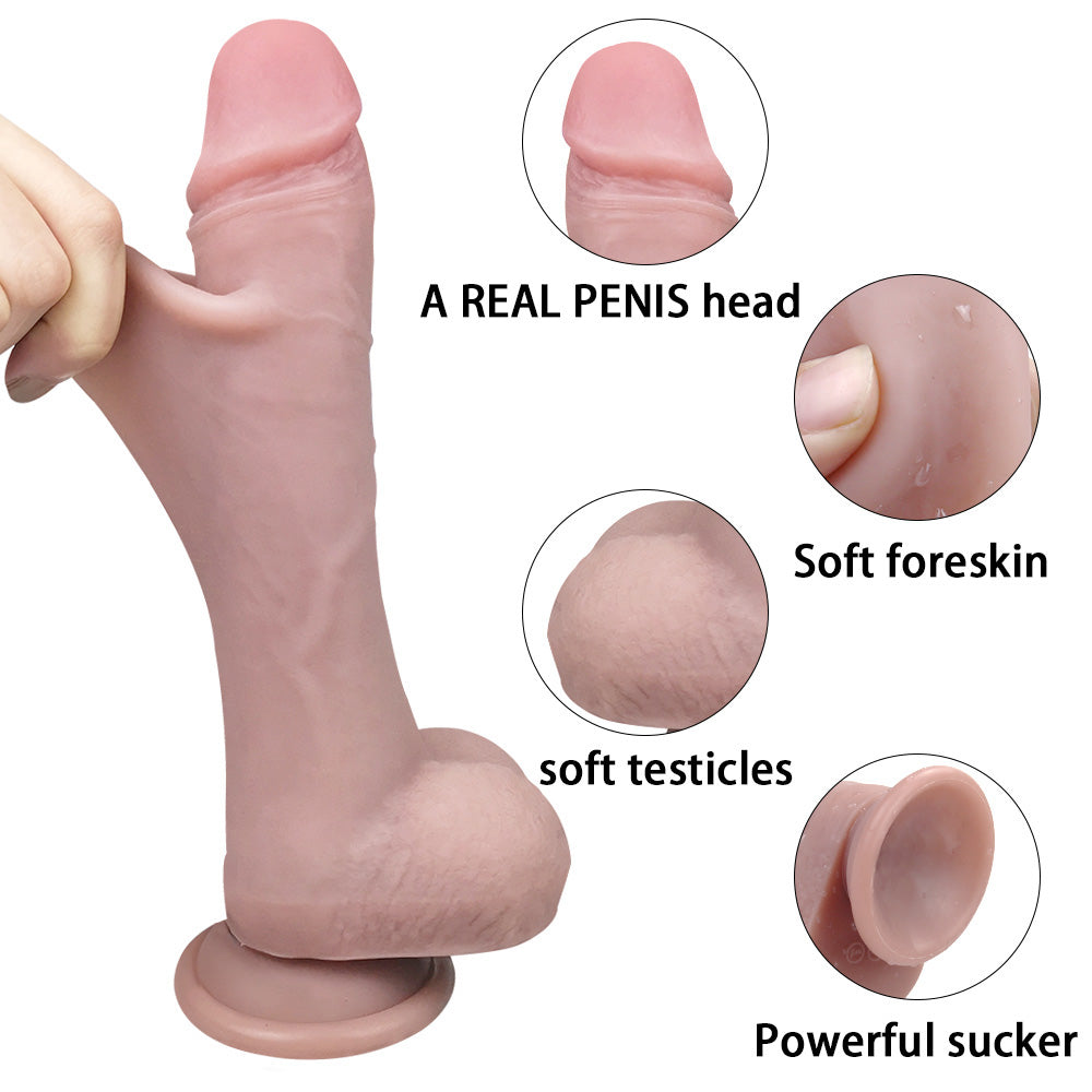 hand holding dildo with close-up on veins, glans, and textured skin detail