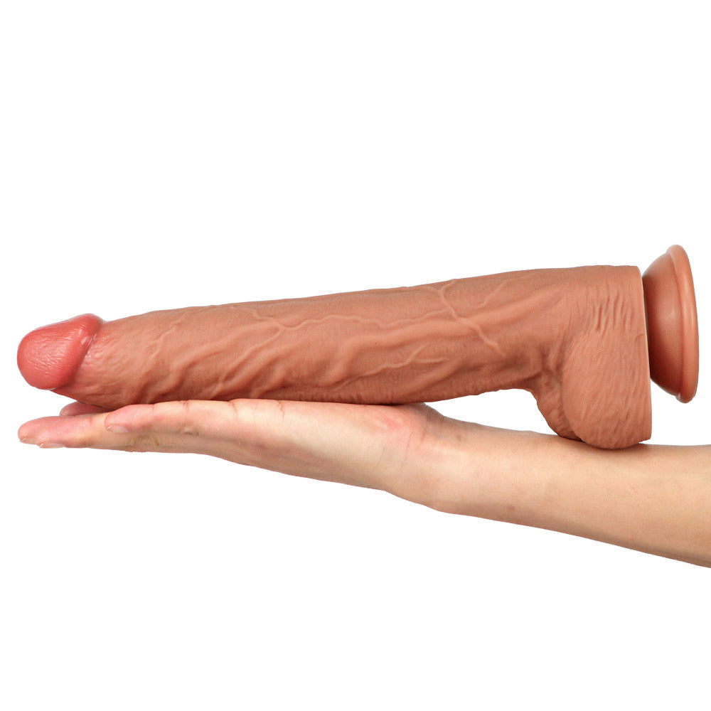 dildo resting across hand and arm to display length, girth, and anatomical realism
