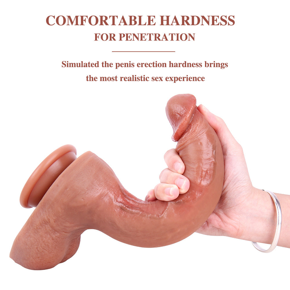 Hand holding the shaft firmly to display its size, girth, and life-like surface details.