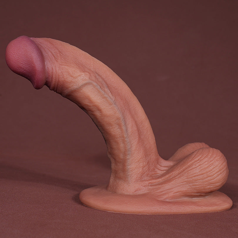 9 inch ultra realistic silicone dildo in light flesh tone with soft curved shaft and veiny detail